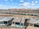 Aerial view showcases backyard, pool, patio, and the scenic desert community setting at 160 Stone Mesa Ct, Henderson, NV 89011