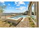 Backyard with a pool, spa, desert landscaping, and mountain view creating a serene retreat at 160 Stone Mesa Ct, Henderson, NV 89011