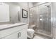 This bathroom features a glass shower, a toilet, and a single sink vanity with ample storage at 160 Stone Mesa Ct, Henderson, NV 89011
