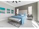 Comfortable bedroom featuring a king-size bed, stylish decor, and ample natural light at 160 Stone Mesa Ct, Henderson, NV 89011