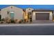 Charming single-story home featuring a two-car garage and professionally landscaped front yard at 160 Stone Mesa Ct, Henderson, NV 89011