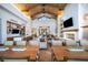 Spacious living area boasts high ceilings, wood beams, stone accents, and an open floor plan at 160 Stone Mesa Ct, Henderson, NV 89011