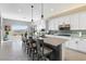 Stylish kitchen with an island, pendant lights and stainless steel appliances at 160 Stone Mesa Ct, Henderson, NV 89011