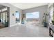 Bright living room featuring tile floors and an expansive view at 160 Stone Mesa Ct, Henderson, NV 89011