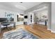 Open-concept living room featuring hardwood floors and modern design at 160 Stone Mesa Ct, Henderson, NV 89011