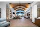 Elegant lounge featuring stone fireplace and floor-to-ceiling windows at 160 Stone Mesa Ct, Henderson, NV 89011