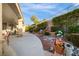 Beautifully landscaped backyard with a covered patio, perfect for outdoor relaxation and gatherings at 1700 Wellington Springs Ave, Henderson, NV 89052