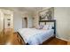 Bedroom with hardwood floors, neutral colors, and closet at 1700 Wellington Springs Ave, Henderson, NV 89052