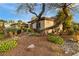 Charming home with desert landscaping, enhancing curb appeal at 1700 Wellington Springs Ave, Henderson, NV 89052