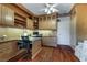 Dedicated office with custom wood built-ins, desk space, and ample storage at 1700 Wellington Springs Ave, Henderson, NV 89052