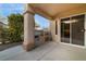 Outdoor kitchen featuring a built-in grill, providing an ideal space for entertaining at 1700 Wellington Springs Ave, Henderson, NV 89052