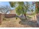 Backyard featuring a low stacked stone wall, and drought resistant foliage at 1800 Montvale Ct, Las Vegas, NV 89134