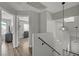 Upstairs hallway features modern lighting and luxury vinyl plank flooring at 1800 Montvale Ct, Las Vegas, NV 89134
