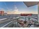 Cozy balcony with seating and views of the city skyline and mountains, perfect for relaxing at 200 W Sahara Ave # 801, Las Vegas, NV 89102