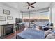 Bright bedroom featuring floor-to-ceiling windows and an electric fireplace at 200 W Sahara Ave # 801, Las Vegas, NV 89102