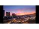 Breathtaking city view at sunset from the balcony with Christmas garland on the railing at 200 W Sahara Ave # 801, Las Vegas, NV 89102