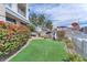 Beautiful dog park area with an artificial lawn, bushes and trees outside the building at 200 W Sahara Ave # 801, Las Vegas, NV 89102
