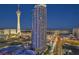 High-rise with views of the Stratosphere Tower, city lights, and mountain ranges at night at 200 W Sahara Ave # 801, Las Vegas, NV 89102
