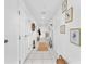 Hallway with decorative elements and bright white walls at 200 W Sahara Ave # 801, Las Vegas, NV 89102