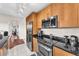 Bright kitchen featuring a breakfast bar, stainless steel appliances, and modern cabinetry at 200 W Sahara Ave # 801, Las Vegas, NV 89102