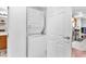 Convenient laundry room featuring a stacked washer and dryer at 200 W Sahara Ave # 801, Las Vegas, NV 89102