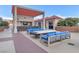 Outdoor kitchen with a fire pit and seating area at 200 W Sahara Ave # 801, Las Vegas, NV 89102