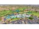 Overhead view of community amenities including pool, tennis courts, and lush green spaces at 2136 Eagle Sticks Dr, Henderson, NV 89012