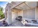 Inviting covered patio with comfortable seating, a pergola and stylish decor at 2136 Eagle Sticks Dr, Henderson, NV 89012