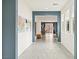 Inviting hallway with tiled floors leading to the open living spaces at 2150 Grant Union Ct, Laughlin, NV 89029