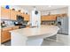 Modern kitchen featuring stainless appliances, granite countertops, and ample cabinet space at 2150 Grant Union Ct, Laughlin, NV 89029