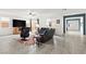 Bright living area with tile floors, a sliding glass door, and an open layout for entertaining at 2150 Grant Union Ct, Laughlin, NV 89029