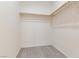 This spacious walk-in closet features wood-look floors and plenty of room for your belongings at 2150 Grant Union Ct, Laughlin, NV 89029
