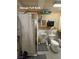Practical full bathroom in garage with shower and toilet at 2300 S Washoe Ave, Pahrump, NV 89048