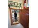 Electrical panel with open wooden door at 2300 S Washoe Ave, Pahrump, NV 89048