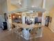 Modern kitchen with granite countertops, pendant lighting, and bar seating area at 2300 S Washoe Ave, Pahrump, NV 89048