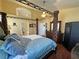 Spacious main bedroom with a four-poster bed, walk-in closet, and ensuite bathroom at 2300 S Washoe Ave, Pahrump, NV 89048