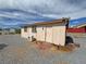 Exterior shot of outbuilding featuring neutral paint, complementing the style of the main house at 2300 S Washoe Ave, Pahrump, NV 89048