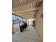 Covered patio with grill and seating area at 2300 S Washoe Ave, Pahrump, NV 89048