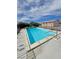 Backyard pool with patio and clear blue skies at 2300 S Washoe Ave, Pahrump, NV 89048