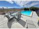 Relaxing poolside patio area with comfortable seating, ideal for soaking up the sun and enjoying the outdoors at 2300 S Washoe Ave, Pahrump, NV 89048