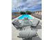 Outdoor dining area with a pool view, perfect for enjoying meals in a relaxed and scenic setting at 2300 S Washoe Ave, Pahrump, NV 89048