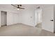Spacious bedroom with new carpet, ceiling fan, and walk-in closet at 2521 Richfield Blvd, Las Vegas, NV 89102