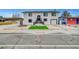 Two-story home with a modern design, featuring a landscaped front yard and a garage at 2521 Richfield Blvd, Las Vegas, NV 89102