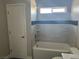 Stylish bathroom showcasing a tub with tiled wall accents at 2530 S Tecumseh Ave, Pahrump, NV 89048