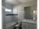 Modern bathroom featuring a double vanity and stylish fixtures at 2530 S Tecumseh Ave, Pahrump, NV 89048