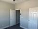 Neutral bedroom with closet and entry doors offering convenience and functionality at 2530 S Tecumseh Ave, Pahrump, NV 89048