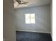 Neutral bedroom showcasing a window with views of the outdoors at 2530 S Tecumseh Ave, Pahrump, NV 89048