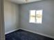 Bright bedroom featuring a window with views at 2530 S Tecumseh Ave, Pahrump, NV 89048