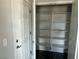 Open closet featuring built in shelving and a functional design at 2530 S Tecumseh Ave, Pahrump, NV 89048