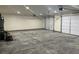 Functional garage with multiple car capacity and concrete floors, easy access at 2530 S Tecumseh Ave, Pahrump, NV 89048